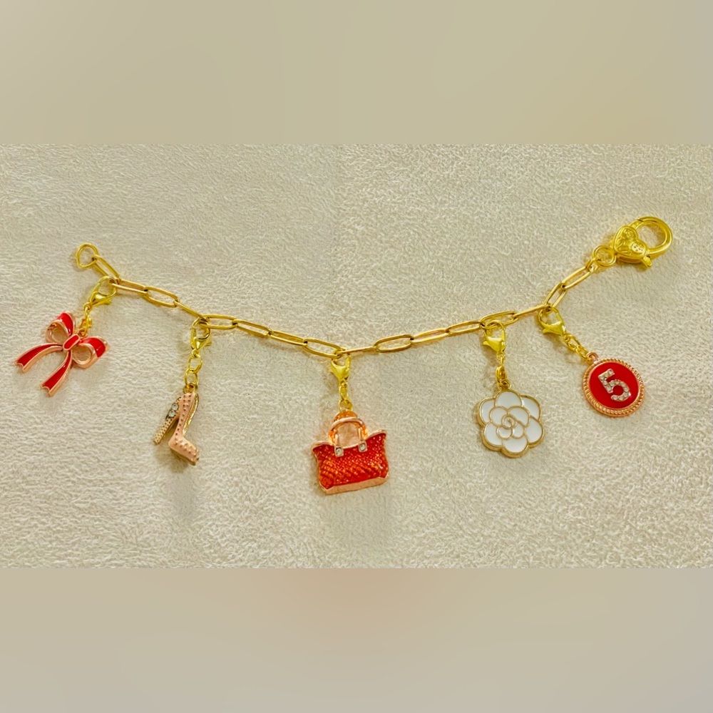 NWT HANDMADE BRACELET WITH CHARMS
